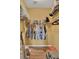 Walk-in closet with organized shelving and clothing racks at 27302 Stoney Brook Dr, Leesburg, FL 34748