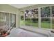 Enclosed sunroom provides seamless connection to the outdoors at 27302 Stoney Brook Dr, Leesburg, FL 34748