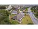 Picture of neighborhood roads and cul-de-sac, with mature tree coverage, homes and grassy lawns at 2954 Heiny Pl, The Villages, FL 32163