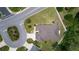 Bird's eye view of a home featuring manicured lawn and landscaping, situated near well-maintained streets at 2954 Heiny Pl, The Villages, FL 32163