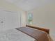 Bedroom featuring carpet, a window, and a closet at 2954 Heiny Pl, The Villages, FL 32163