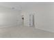 Spacious bedroom featuring neutral carpet, ceiling fan, and en-suite bathroom at 2954 Heiny Pl, The Villages, FL 32163
