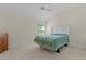 Bedroom featuring vaulted ceilings, carpet, and a window offering lots of natural light at 2954 Heiny Pl, The Villages, FL 32163