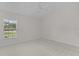 Bedroom with a window for plenty of natural light at 2954 Heiny Pl, The Villages, FL 32163