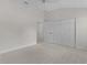 Bedroom with double door closet and doorway at 2954 Heiny Pl, The Villages, FL 32163