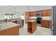 Modern kitchen with stainless steel appliances and granite countertops at 2954 Heiny Pl, The Villages, FL 32163
