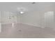 Spacious living area with neutral tones and ample natural light at 2954 Heiny Pl, The Villages, FL 32163