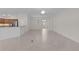 Open-concept living space seamlessly connecting the kitchen and dining areas at 2954 Heiny Pl, The Villages, FL 32163