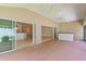 Entertainer's patio featuring wet bar and view into the kitchen and living room at 2954 Heiny Pl, The Villages, FL 32163