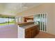 Entertainer's patio featuring wet bar and screened in porch at 2954 Heiny Pl, The Villages, FL 32163
