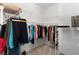 Walk-in closet with wire shelving and clothing racks for organized storage at 2954 Heiny Pl, The Villages, FL 32163