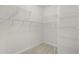 Spacious walk-in closet featuring wire shelving, providing ample storage space at 2954 Heiny Pl, The Villages, FL 32163