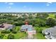 Beautiful aerial view of the house showcasing its landscaping, and attached garage at 2991 Saint Thomas Ln, The Villages, FL 32162
