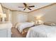 Bedroom featuring twin beds, neutral decor, ceiling fan, and a closet at 2991 Saint Thomas Ln, The Villages, FL 32162