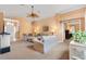 Comfortable living room featuring an open layout with views of the entryway and bedroom at 2991 Saint Thomas Ln, The Villages, FL 32162