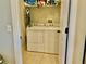 Bright laundry room featuring a side-by-side washer and dryer at 30604 Apawamis Dr, Sorrento, FL 32776