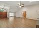 Entryway with vaulted ceiling, wood floors, and arched front door at 37236 Cherry Lake Rd, Fruitland Park, FL 34731