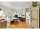 Spacious main bedroom featuring hard wood floors, a lounge sofa and a large bed at 3819 Saint Emma Ct, Leesburg, FL 34748