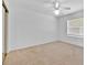 Bedroom featuring neutral carpet and sliding door closet at 39 Pine Court Dr, Ocala, FL 34472