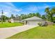 This beautiful single-Gathering home has great curb appeal with a spacious lawn and an attached garage at 39 Pine Court Dr, Ocala, FL 34472