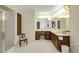 Expansive bathroom with tiled floors, a vanity area, and a shower with a glass door at 39132 Grays Airport Rd, Lady Lake, FL 32159