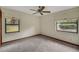 Bedroom offers a view of the green outdoor scenery at 39132 Grays Airport Rd, Lady Lake, FL 32159