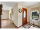 Inviting home foyer with natural light, detailed molding, and stylish accents creating a warm and welcoming atmosphere at 39132 Grays Airport Rd, Lady Lake, FL 32159