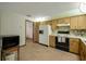 Bright kitchen with tile floor and modern appliances at 39132 Grays Airport Rd, Lady Lake, FL 32159