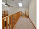 A loft boasts skylights, beamed ceilings, and natural light at 39132 Grays Airport Rd, Lady Lake, FL 32159