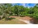 Mature trees scattered across a large lot at 39132 Grays Airport Rd, Lady Lake, FL 32159