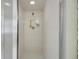 Clean, tiled shower stall with modern fixtures and a clear glass enclosure at 39132 Grays Airport Rd, Lady Lake, FL 32159