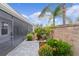 Stone walls and garden feature in the backyard at 3978 Nottingham Loop, The Villages, FL 32163