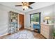 Bright bedroom with neutral walls and a storage shelf at 400 W Washington St, Minneola, FL 34715