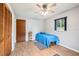 Well-lit bedroom with ample storage at 400 W Washington St, Minneola, FL 34715