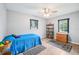 Bedroom featuring natural light and wood-look floors at 400 W Washington St, Minneola, FL 34715