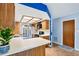 Charming kitchen features wood cabinetry, and bright countertops at 400 W Washington St, Minneola, FL 34715