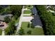 Residential street with well-maintained homes, lush landscaping, and tidy lawns, creating a peaceful neighborhood at 4634 Bigler Ln, Mount Dora, FL 32757