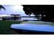 Tranquil backyard featuring kayaks and a waterfront dock at 4634 Bigler Ln, Mount Dora, FL 32757