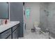 Elegant bathroom features a walk-in shower, modern vanity, and stylish fixtures at 4634 Bigler Ln, Mount Dora, FL 32757