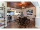 Eat in Kitchen featuring stainless steel appliances, white cabinets, and granite counters at 4634 Bigler Ln, Mount Dora, FL 32757