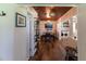 Open-concept living space with a view into the dining area, kitchen, and laundry room at 4634 Bigler Ln, Mount Dora, FL 32757