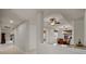 Open-concept living space with views of the dining area and glimpses of the well-maintained backyard at 52 Camino Real Blvd, Howey In The Hills, FL 34737