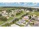Community aerial view shows how lush and established the neighborhood is at 5562 Charleston Avenue, Tavares, FL 32778