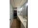 Bathroom with a shower, vanity and light blue walls at 633 Grand Cypress Pt, Sanford, FL 32771