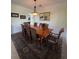 Elegant dining room with wainscoting and decorative chandelier at 633 Grand Cypress Pt, Sanford, FL 32771