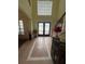 Grand two-story foyer with decorative tile and natural light at 633 Grand Cypress Pt, Sanford, FL 32771