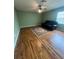 Spacious living room featuring hard wood floors and a couch at 633 Grand Cypress Pt, Sanford, FL 32771
