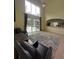 Inviting living room with high ceilings and access to outdoor living at 633 Grand Cypress Pt, Sanford, FL 32771