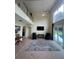 Inviting living room with high ceilings and access to outdoor living at 633 Grand Cypress Pt, Sanford, FL 32771