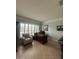 Office space with tile flooring, plantation shutters, crown molding and neutral paint at 633 Grand Cypress Pt, Sanford, FL 32771